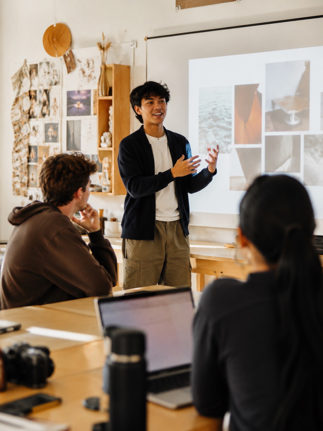 Student presenting a pitch to the room